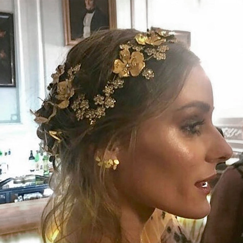 Olivia Palermo wearing the BE earrings